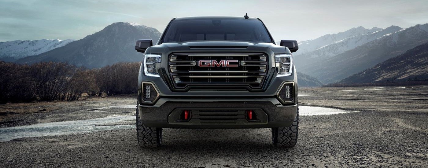 A black 2019 GMC Sierra 1500 AT4 is shown from the front.
